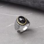 Anillo de ojo de tigre con marco de acero inoxidable
