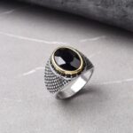 Anillo de ojo de tigre con marco de acero inoxidable