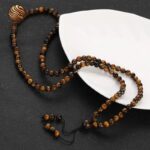 Collar de protección de ojo de tigre: energía de vibración