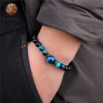 Pulsera de bolas de ojo de halcón de ónix negro